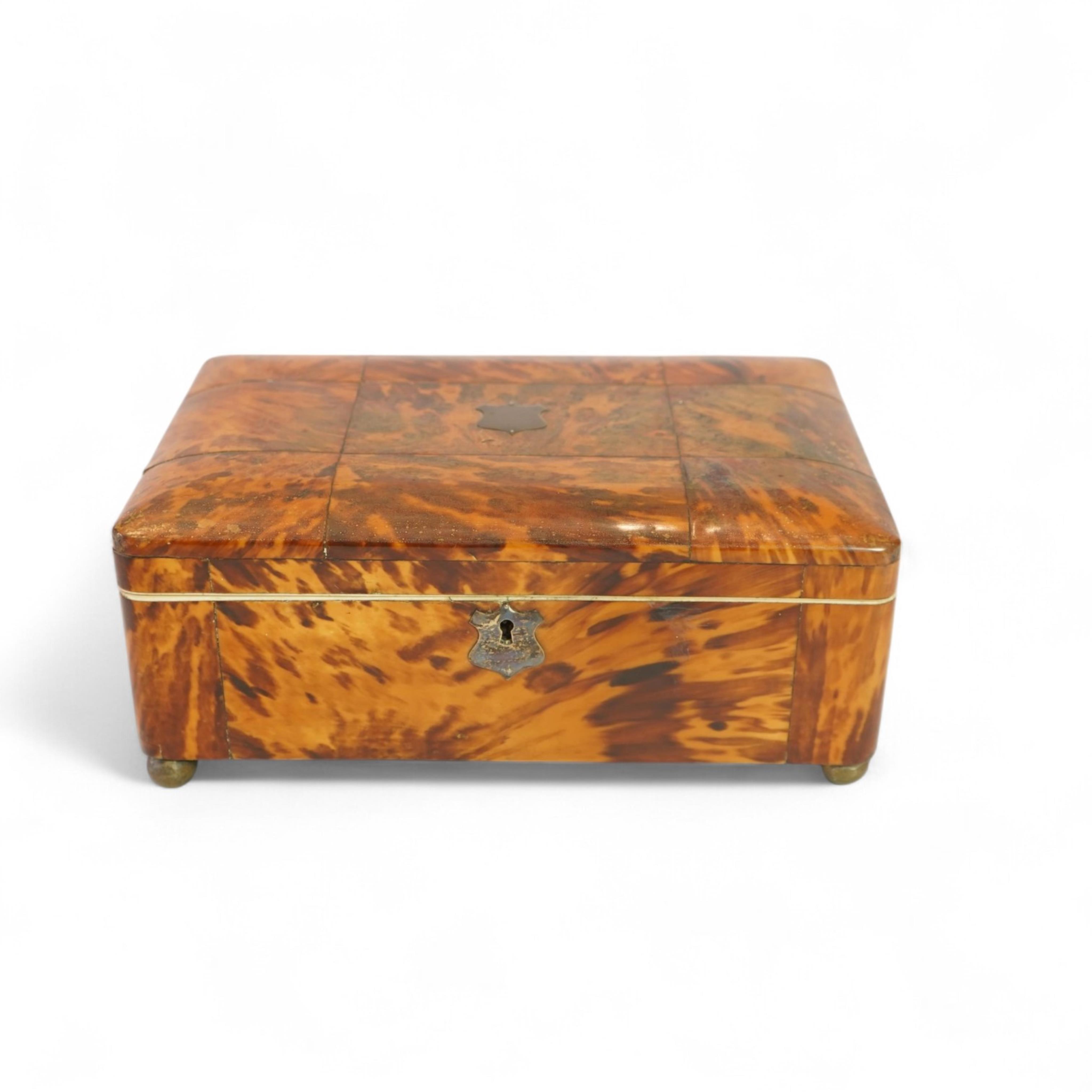 An early 19th century blonde tortoiseshell work box